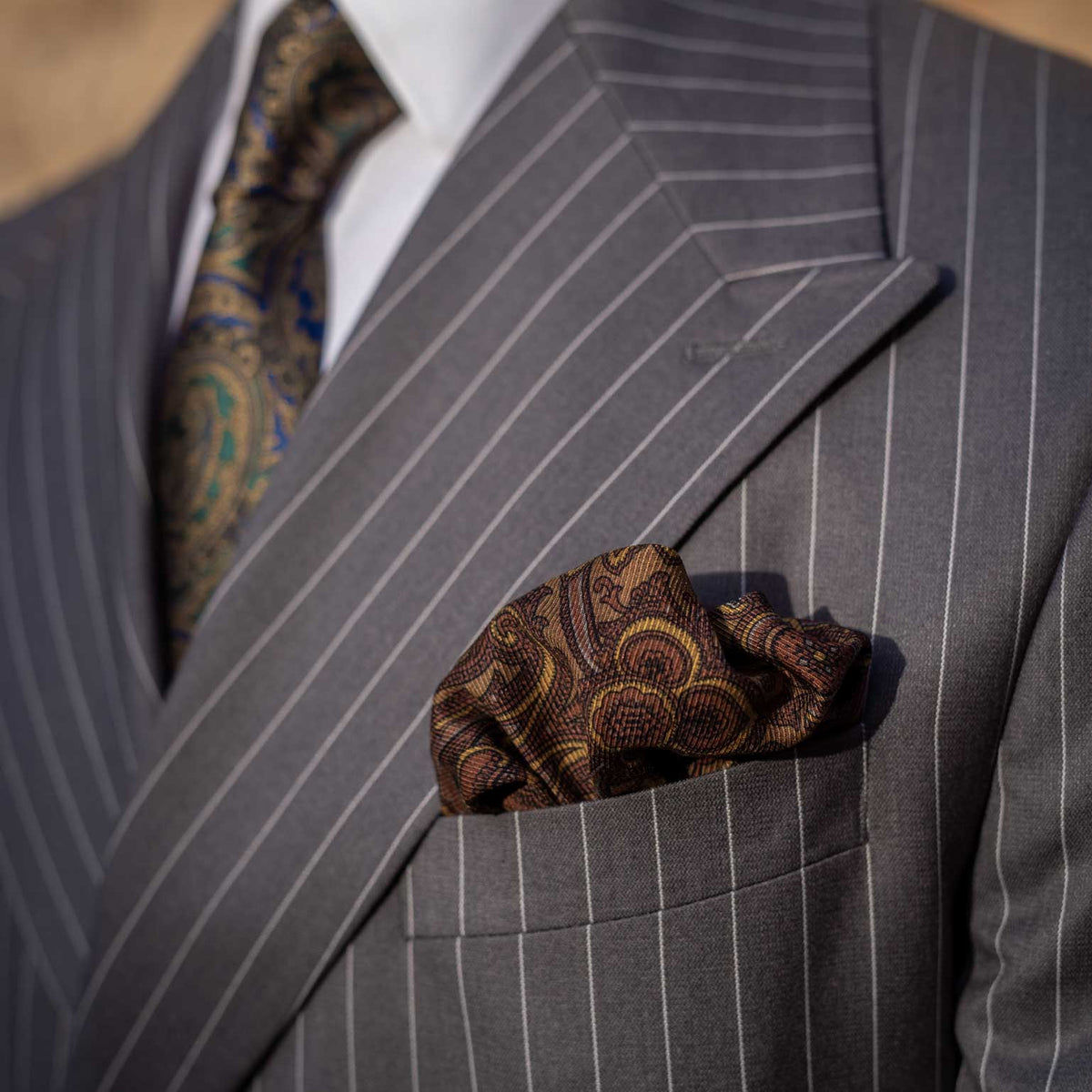 Brown paisley madder silk pocket square