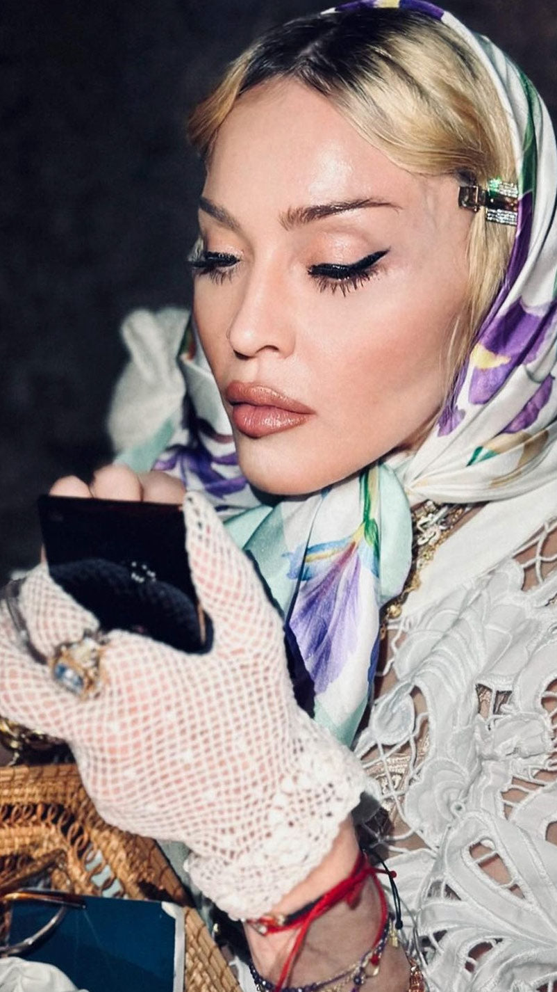 Madonna wearing an Elizabetta silk head square scarf