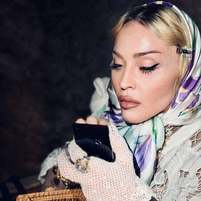 Madonna wearing Elizabetta's handmade Italian silk square head 
scarf