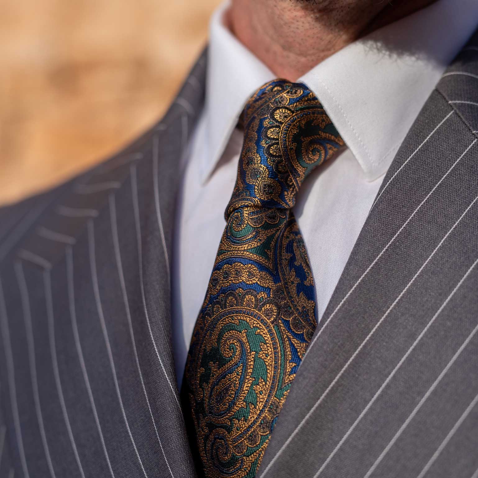 Handmade Men's Jacquard Silk Tie – Classic Paisley Pattern In Gold, Blue & Green