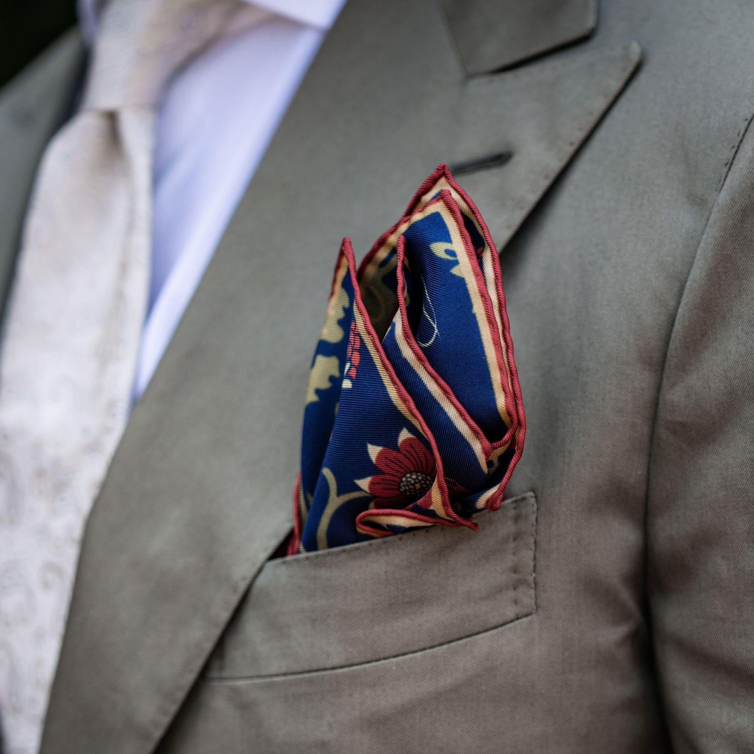 Men's silk pocket square with peacock motif